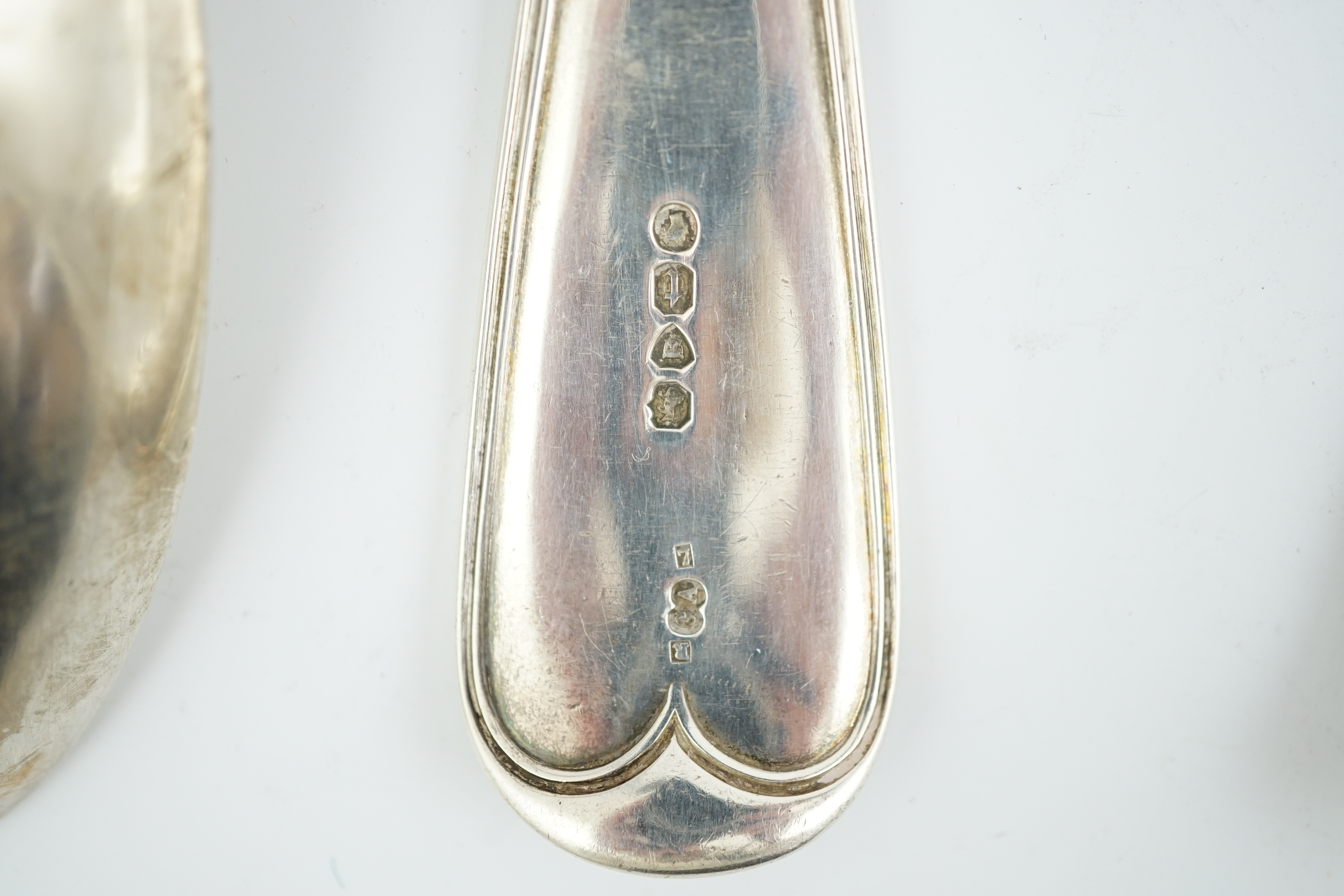 Two early 19th century silver fish slices, Charles Boyton, London, 1831 and Joseph & Albert Savory, London, 1846, largest 31.2cm, together with two 19th century silver basting spoons, William Chawner, London, 1816 and Ge